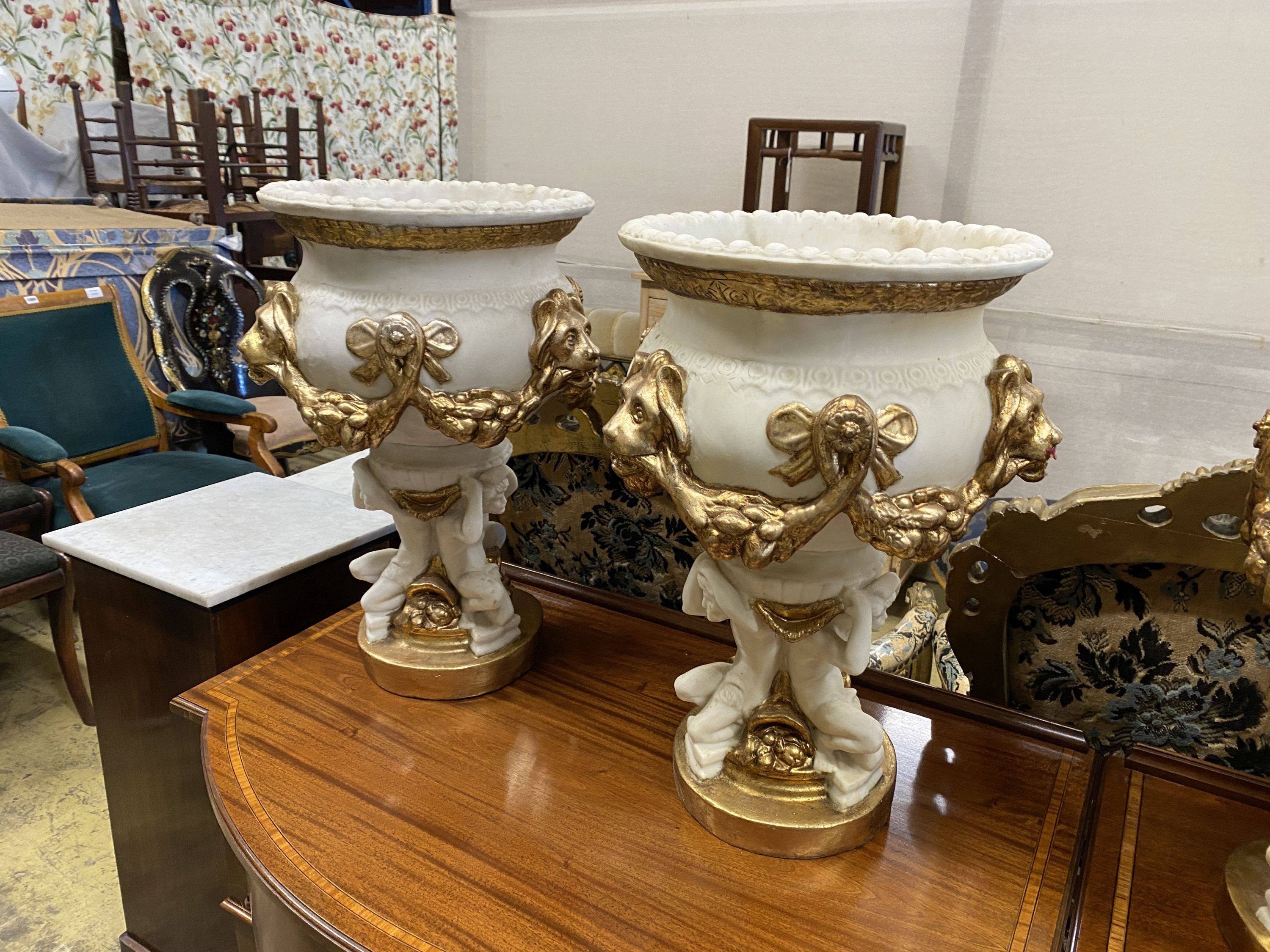A set of four composition faux marble planters, diameter 38cm, height 54cm